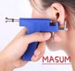 The image displays a MASUM ear piercing gun kit with a stud and mirror. - Image 6